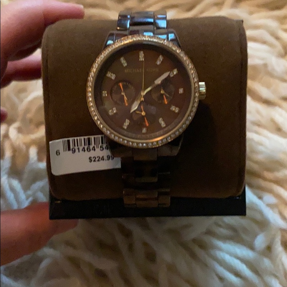 Michael Kors Women’s tortoise band watch